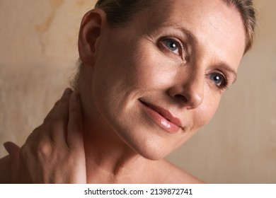 Relief from the days cares. Studio shot of a mature woman with beautiful skin. - Powered by Shutterstock