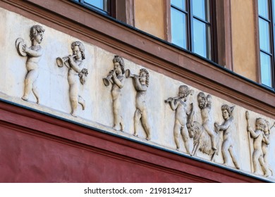 Relief Depicting Little Boys With Musical Instruments And Goat On Front Elevation Of Old Tenement House