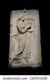 Relief of a Muse playing the cithara, 2nd century B.C. Hellenistic Roman Sculpture. Istanbul Archeology Museum, 2022.