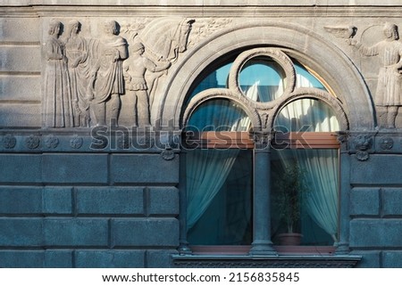Relief panels with scenes from the French Middle Ages, bas-relief near the window. House Vege  on the Kryukov Canal Embankment, St. Petersburg, Russia