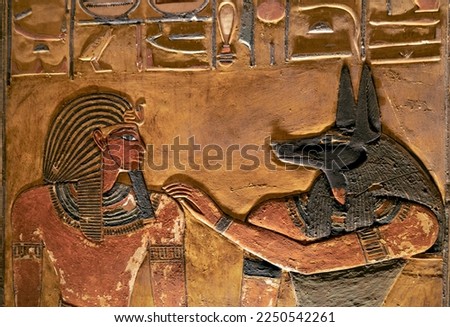 Relief showing Seti first in front of Anubis in his tomb at the Valley of Kings .Luxor . Egypt