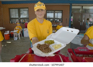 Relief Workers From Red Cross Offering Food To Weary After Hurricane Ivan Hit Pensacola Florida