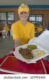 Relief Workers From Red Cross Offering Food To Weary After Hurricane Ivan Hit Pensacola Florida