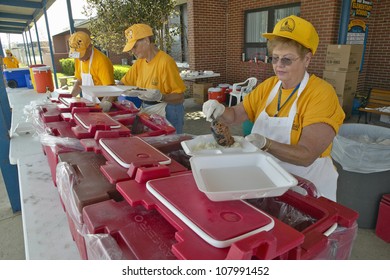 Relief Workers From Red Cross Offering Food To Weary After Hurricane Ivan Hit Pensacola Florida