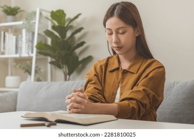 Religion and believe, faith christian woman holding holy bible book in hand, peace and hope of humble. Pray, prayer person meditating, praying to request God, jesus asking for help, spiritual concept.
