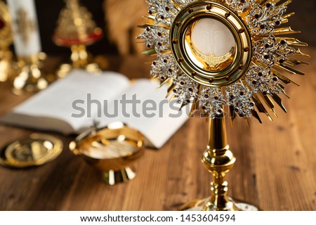 Religion, Christianity, Catholic concept. Wooden table and background.
