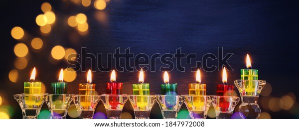 Religion image of\
jewish holiday Hanukkah background with menorah (traditional\
candelabra) and\
candles\

