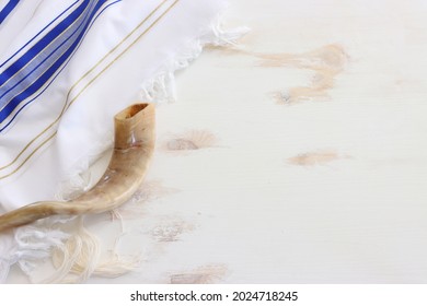 Religion Image Of Shofar (horn) On White Prayer Talit. Rosh Hashanah (jewish New Year Holiday), Shabbat And Yom Kippur Concept