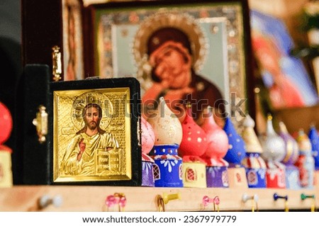 Religious artifacts and decorative items for sale at a market stall