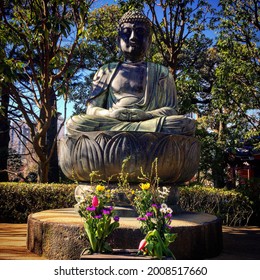 Religious Buda Statue In Tokyo