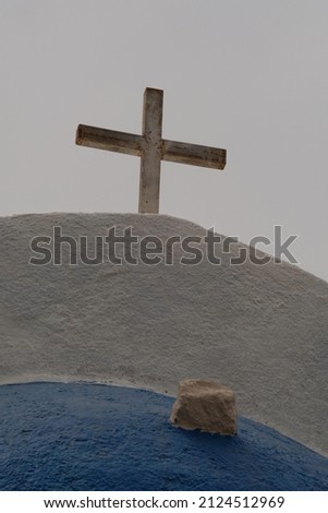 A religious crucifix on the top of n orthodox church in Santorini Greece  Foto stock © 