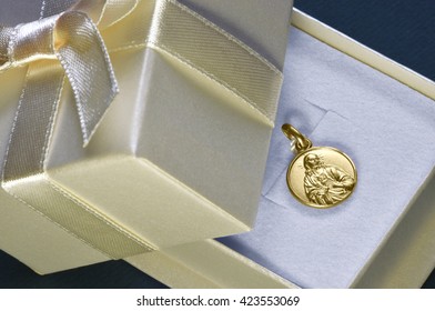 Religious Gold Pendant With Jesus Showing Heart. Typical Gift For First Communion For Catholics.