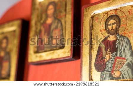 Religious icons and paintings inside an Orthodox curch in Greece