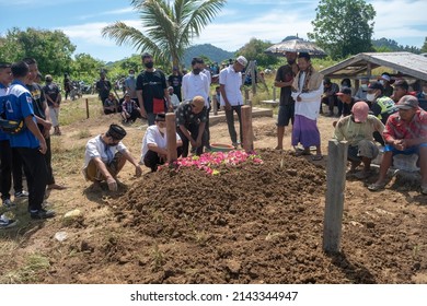 A Religious Leader Is Giving A Lecture And Prayer After The Body Is Buried. Nabire-Papua, 6 April 2022