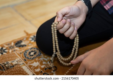 Religious muslim boy praying inside the mosque, muslim boy praying with beats