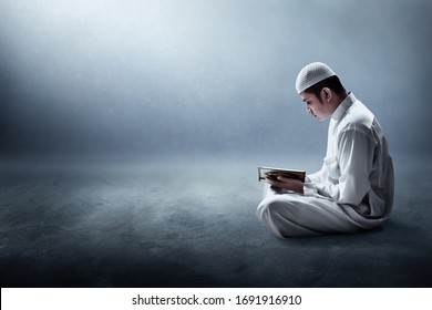 Religious Muslim Man Reading Holy Quran