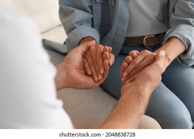 Religious People Holding Hands And Praying Together Indoors, Closeup