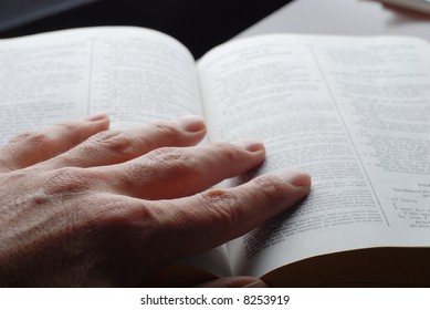 religious person is reading the holly bible
