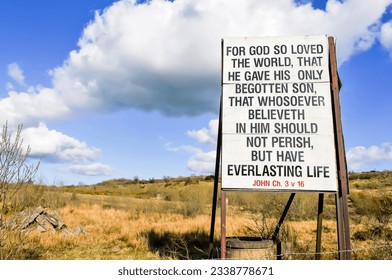 Religious sign typical of many erected in rural Protestant areas of Northern Ireland. "For God so loved the world..."