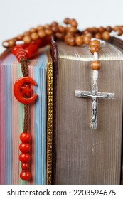 Religious Symbols. Quran, Bible And Prayer Beads. Christianity, Islam. Interfaith Dialogue.  France. 