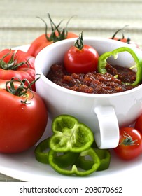 Relish Tomatoes With Peppers Onions And Spices In A Bowl On A Tray.