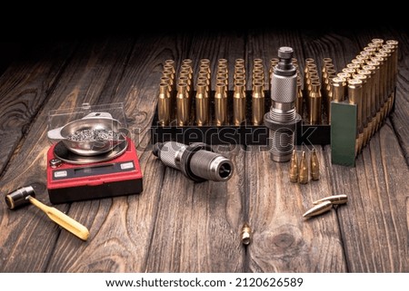 Reloading, accessories and components for reloading cartridges, soft focus.