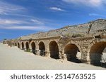 Remains of ancient roman aqueduct at Ceasarea along the coast of the Mediterranean Sea, Israel
