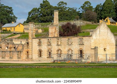 Remains of convict penitentiary with officers quarters top left and William Smith O'Brien's cottage top right, Port Arthur, Tasmania, Australia