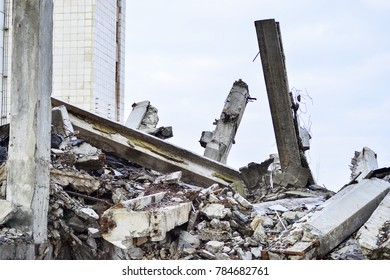 Remains Of The Destroyed Industrial Building. Large Concrete Piles Continue To Hold The Body Of The Large Concrete Buildings, While Others Look At The Sky.