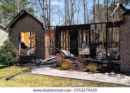 Remains Of A Fire Damaged Single Family Home
