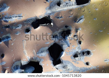 Remains of military aircraft (fighter) punched shell fragments and warmed by explosions of shells. Shoot down an aircraft, grand slam