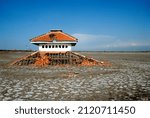 the remains of a mosque building that were submerged in hot mud due to the Lapindo mudflow disaster in Sidoarjo, as well as severe environmental and ecosystem damage, photo taken on May 20, 2008