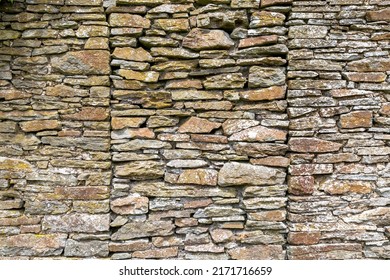 The Remains Of A Very Old Stone Wall Of An Derelict House In The Brecon Beacons In South Wales UK
