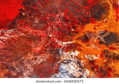 A remarkable multicolored jasper with patterns resembling those of watercolor drawing occurs in a deposit at Ural Mountains. Natural patterns and texture of slice of multicolored jasper stone surfaces