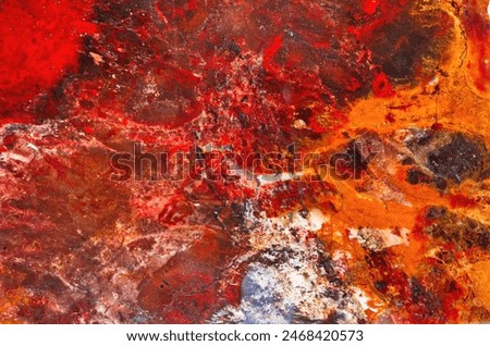 A remarkable multicolored jasper with patterns resembling those of watercolor drawing occurs in a deposit at Ural Mountains. Natural patterns and texture of slice of multicolored jasper stone surfaces
