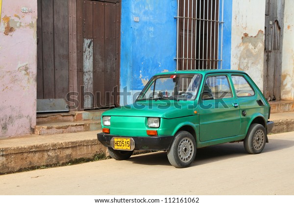 REMEDIOS,\
CUBA - FEBRUARY 20: Old Polish car Fiat 126 on February 20, 2011 in\
Remedios, Cuba. New change in law allows Cubans to trade cars. Cars\
in Cuba are very old because of the old\
law.