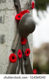 Remembrance Day In Canada. Red Poppies On Monument. 