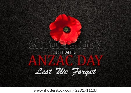 The remembrance poppy - poppy appeal. Poppy flower on black textured background with text. Decorative flower for Anzac Day in New Zealand, Australia, Canada and Great Britain.