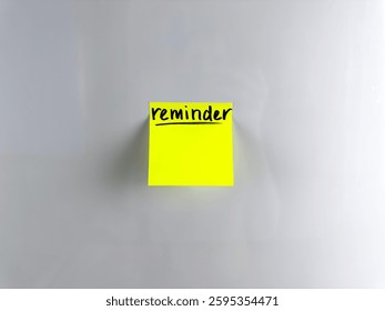 Reminder concept. Write down important information on sticky note. Bright paper with marker writing for memorization. Staff to write down important information
