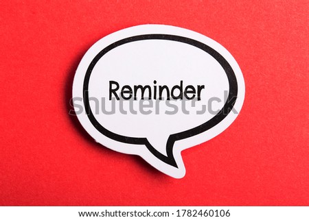Reminder speech bubble isolated on the red background.