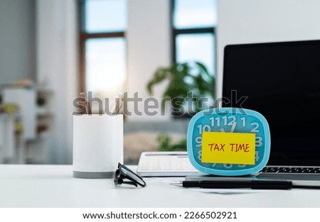 Reminder of tax time on office desk