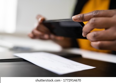 Remote Check Deposit Taking Photo With Mobile Phone - Shutterstock ID 1772914670