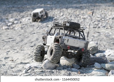 remote controlled jeep driving over stones