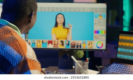 Remote graphic designer using advanced editing software to retouch images, embodying creativity and technological power of the digital art industry. Retouching work at home. Camera A.