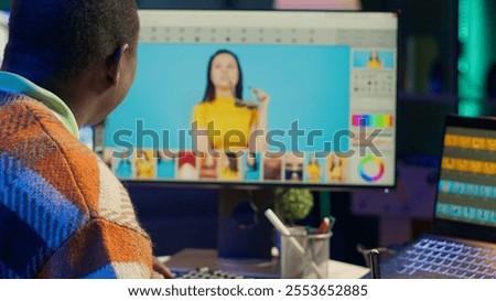 Remote graphic designer using advanced editing software to retouch images, embodying creativity and technological power of the digital art industry. Retouching work at home. Camera A.
