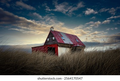 Remote house with a dramatic sky
