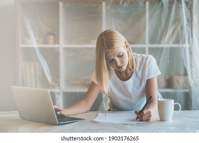 Remote Job. Distance Work. Pandemic Furlough. Tired Freelancer Keyworker Woman Busy With Project Alone With Laptop At Light Virtual Office Covered With Polyethylene Film.