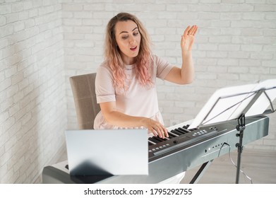 Remote Music Lessons. A Singing Teacher Records The Lesson On A Laptop Webcam.