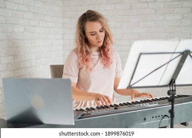 Remote Music Lessons. A Singing Teacher Records The Lesson On A Laptop Webcam.