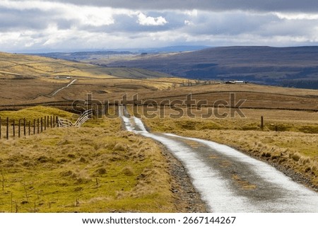 Remote Single track road with a view of Teesdale, County Durham, England, UK.